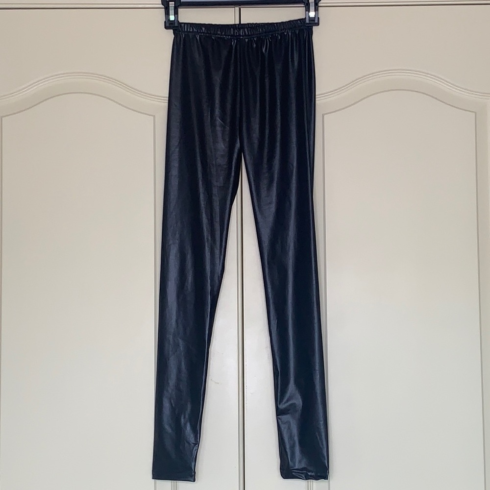 Black, shiny leggings. listed size M but fits XS.